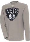 Main image for Antigua Brooklyn Nets Mens Oatmeal Flier Bunker Long Sleeve Crew Sweatshirt