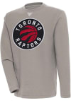 Main image for Antigua Toronto Raptors Mens Oatmeal Flier Bunker Long Sleeve Crew Sweatshirt