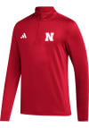 Main image for Adidas Nebraska Cornhuskers Mens Red Golf Long Sleeve 1/4 Zip Pullover