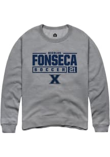 Nicolas Fonseca  Rally Xavier Musketeers Mens Graphite NIL Stacked Box Long Sleeve Crew Sweatshi..