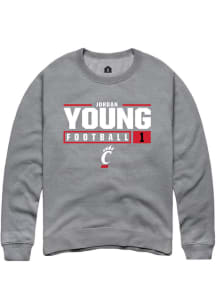 Jordan Young  Rally Cincinnati Bearcats Mens Graphite NIL Stacked Box Long Sleeve Crew Sweatshir..